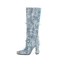 Bottes hautes bleues à talons hauts et bout carré avec papillon