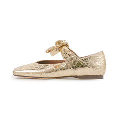Bequeme Ballerinas aus goldenem Leder mit metallischer quadratischer Spitze und Schleife